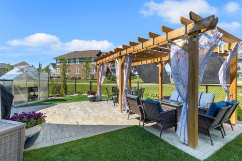 168 Magnolia Manor Se, Calgary, AB - Outdoor With Deck Patio Veranda