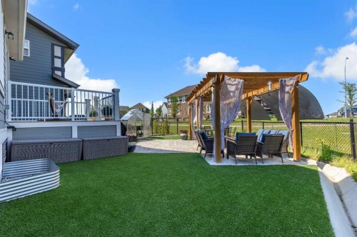 168 Magnolia Manor Se, Calgary, AB - Outdoor With Deck Patio Veranda