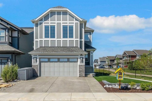 168 Magnolia Manor Se, Calgary, AB - Outdoor With Facade