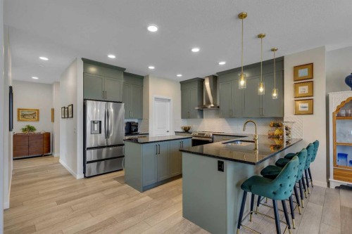 168 Magnolia Manor Se, Calgary, AB - Indoor Photo Showing Kitchen With Stainless Steel Kitchen With Upgraded Kitchen