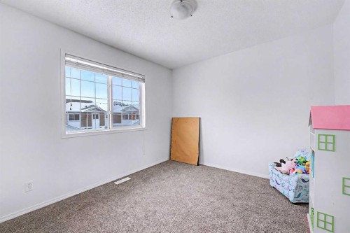 102-800 Yankee Valley Boulevard Se, Airdrie, AB - Indoor Photo Showing Other Room