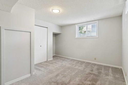 102 Thorson Crescent, Okotoks, AB - Indoor Photo Showing Other Room