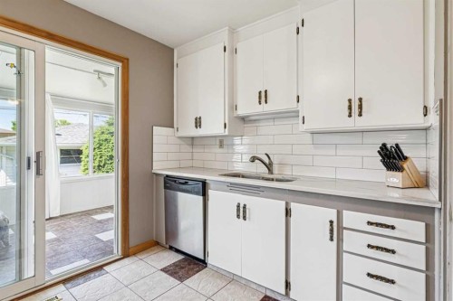 1219 Renfrew Drive Ne, Calgary, AB - Indoor Photo Showing Kitchen With Double Sink