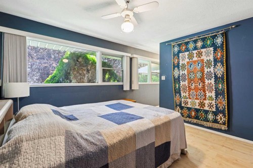 1219 Renfrew Drive Ne, Calgary, AB - Indoor Photo Showing Bedroom