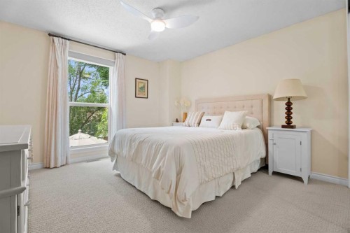 15 Lock Crescent, Okotoks, AB - Indoor Photo Showing Bedroom