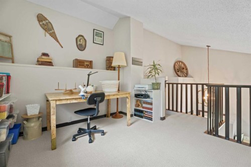 15 Lock Crescent, Okotoks, AB - Indoor Photo Showing Other Room