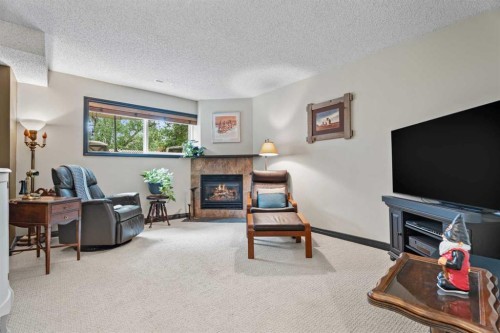15 Lock Crescent, Okotoks, AB - Indoor With Fireplace