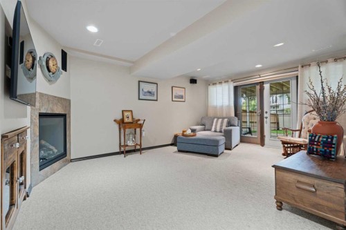 15 Lock Crescent, Okotoks, AB - Indoor With Fireplace