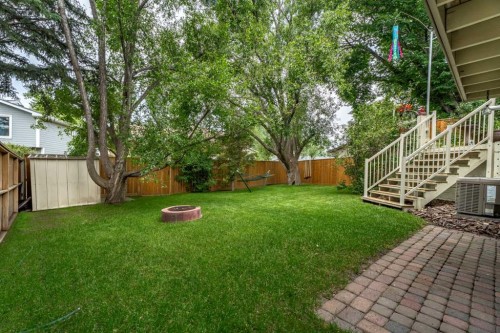 15 Lock Crescent, Okotoks, AB - Outdoor With Deck Patio Veranda With Backyard