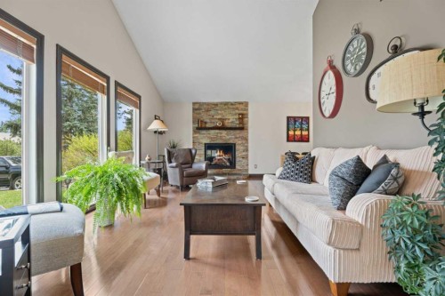 15 Lock Crescent, Okotoks, AB - Indoor Photo Showing Living Room With Fireplace