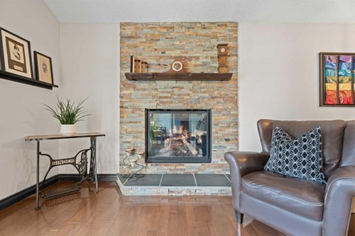 15 Lock Crescent, Okotoks, AB - Indoor Photo Showing Living Room With Fireplace