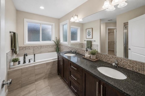 144 Cougar Ridge Manor Sw, Calgary, AB 