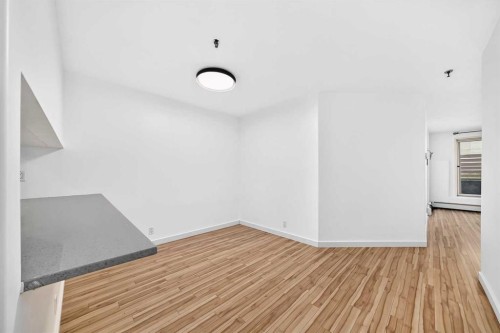 110-525 56 Avenue Sw, Calgary, AB - Indoor Photo Showing Other Room