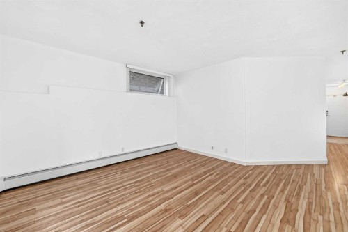 110-525 56 Avenue Sw, Calgary, AB - Indoor Photo Showing Other Room