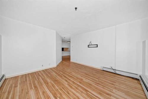 110-525 56 Avenue Sw, Calgary, AB - Indoor Photo Showing Other Room