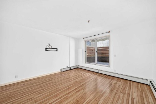 110-525 56 Avenue Sw, Calgary, AB - Indoor Photo Showing Other Room