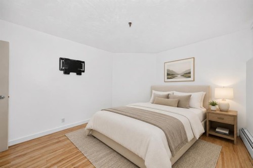 110-525 56 Avenue Sw, Calgary, AB - Indoor Photo Showing Bedroom