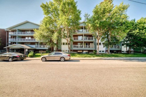 110-525 56 Avenue Sw, Calgary, AB - Outdoor With Facade