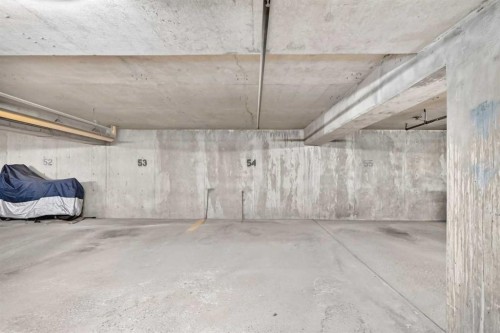 110-525 56 Avenue Sw, Calgary, AB - Indoor Photo Showing Garage