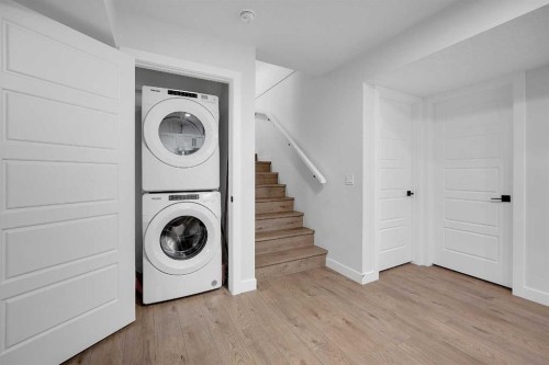 16 Legacy Glen Green Se, Calgary, AB - Indoor Photo Showing Laundry Room