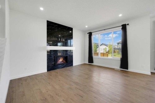 16 Legacy Glen Green Se, Calgary, AB - Indoor Photo Showing Living Room With Fireplace