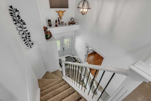 54 Thomas Street Nw, Langdon, AB - Indoor Photo Showing Other Room