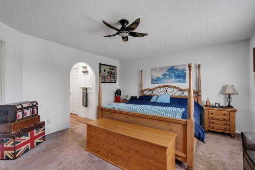 54 Thomas Street Nw, Langdon, AB - Indoor Photo Showing Bedroom