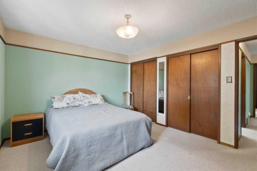 6832 Huntchester Road Ne, Calgary, AB - Indoor Photo Showing Bedroom