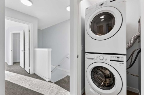 203-1750 Rangeview Drive Se, Calgary, AB - Indoor Photo Showing Laundry Room