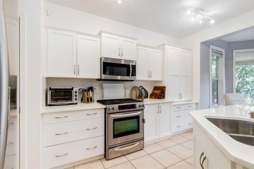 8631 Wentworth Drive Sw, Calgary, AB - Indoor Photo Showing Kitchen With Double Sink