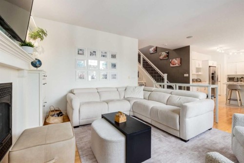 8631 Wentworth Drive Sw, Calgary, AB - Indoor Photo Showing Living Room With Fireplace