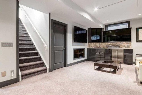 8631 Wentworth Drive Sw, Calgary, AB - Indoor Photo Showing Other Room With Fireplace