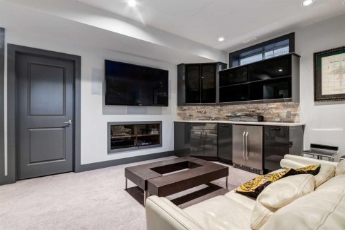 8631 Wentworth Drive Sw, Calgary, AB - Indoor Photo Showing Living Room With Fireplace