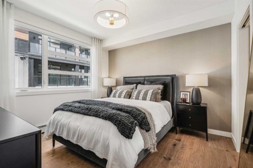 2303-55 Lucas Way Nw, Calgary, AB - Indoor Photo Showing Bedroom