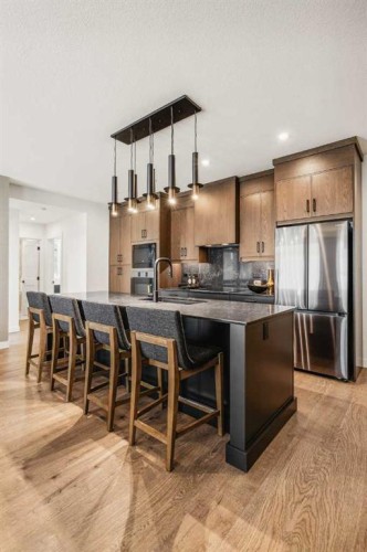 2303-55 Lucas Way Nw, Calgary, AB - Indoor Photo Showing Kitchen With Upgraded Kitchen