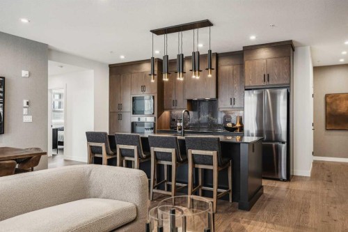 2303-55 Lucas Way Nw, Calgary, AB - Indoor Photo Showing Kitchen With Upgraded Kitchen