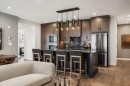 2303-55 Lucas Way Nw, Calgary, AB  - Indoor Photo Showing Kitchen With Upgraded Kitchen 