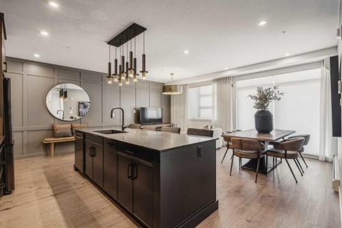 2303-55 Lucas Way Nw, Calgary, AB - Indoor Photo Showing Kitchen With Upgraded Kitchen