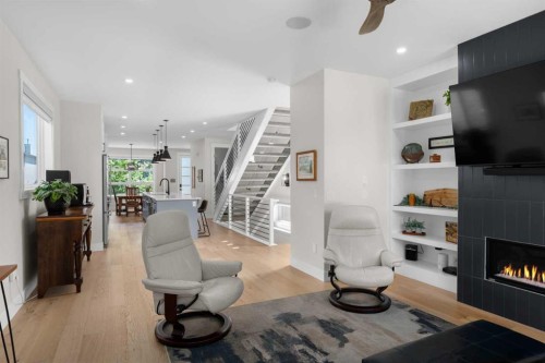 2407 33 Street Sw, Calgary, AB - Indoor Photo Showing Living Room With Fireplace
