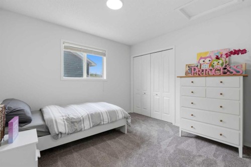 218 Bridlewood Place Sw, Calgary, AB - Indoor Photo Showing Bedroom