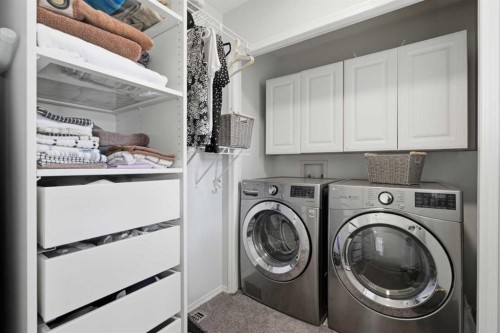 218 Bridlewood Place Sw, Calgary, AB - Indoor Photo Showing Laundry Room