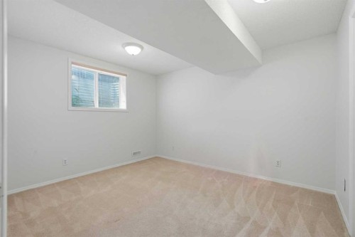 218 Bridlewood Place Sw, Calgary, AB - Indoor Photo Showing Other Room