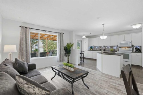 218 Bridlewood Place Sw, Calgary, AB - Indoor Photo Showing Living Room