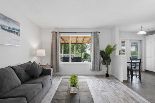 218 Bridlewood Place Sw, Calgary, AB - Indoor Photo Showing Living Room