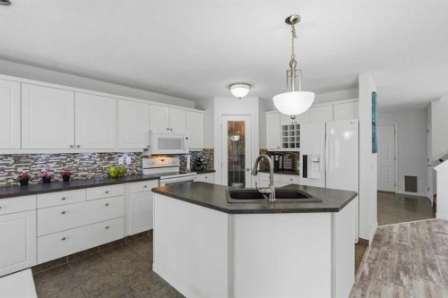 218 Bridlewood Place Sw, Calgary, AB - Indoor Photo Showing Kitchen