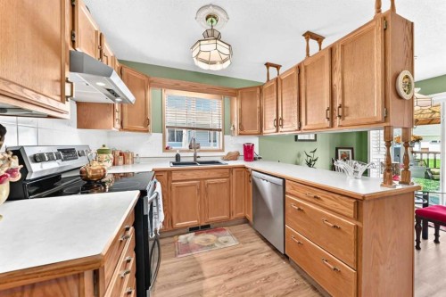49-2821 Botterill Crescent, Red Deer, AB - Indoor Photo Showing Kitchen With Double Sink