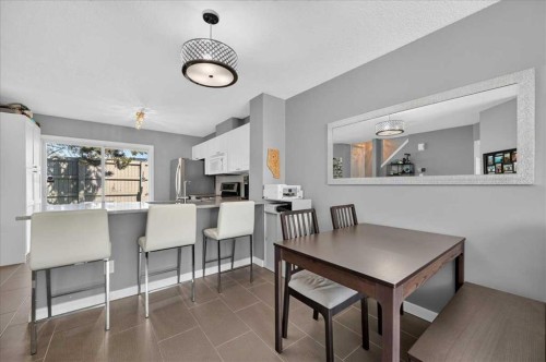 113 Tuscany Springs Gardens Nw, Calgary, AB - Indoor Photo Showing Dining Room