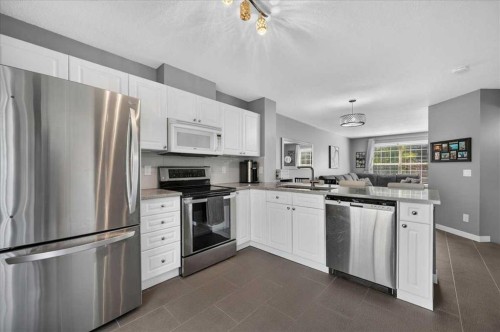 113 Tuscany Springs Gardens Nw, Calgary, AB - Indoor Photo Showing Kitchen With Stainless Steel Kitchen