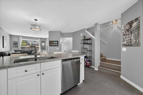 113 Tuscany Springs Gardens Nw, Calgary, AB - Indoor Photo Showing Kitchen With Double Sink