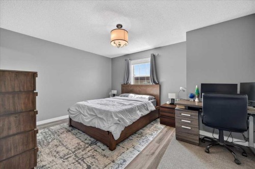 113 Tuscany Springs Gardens Nw, Calgary, AB - Indoor Photo Showing Bedroom